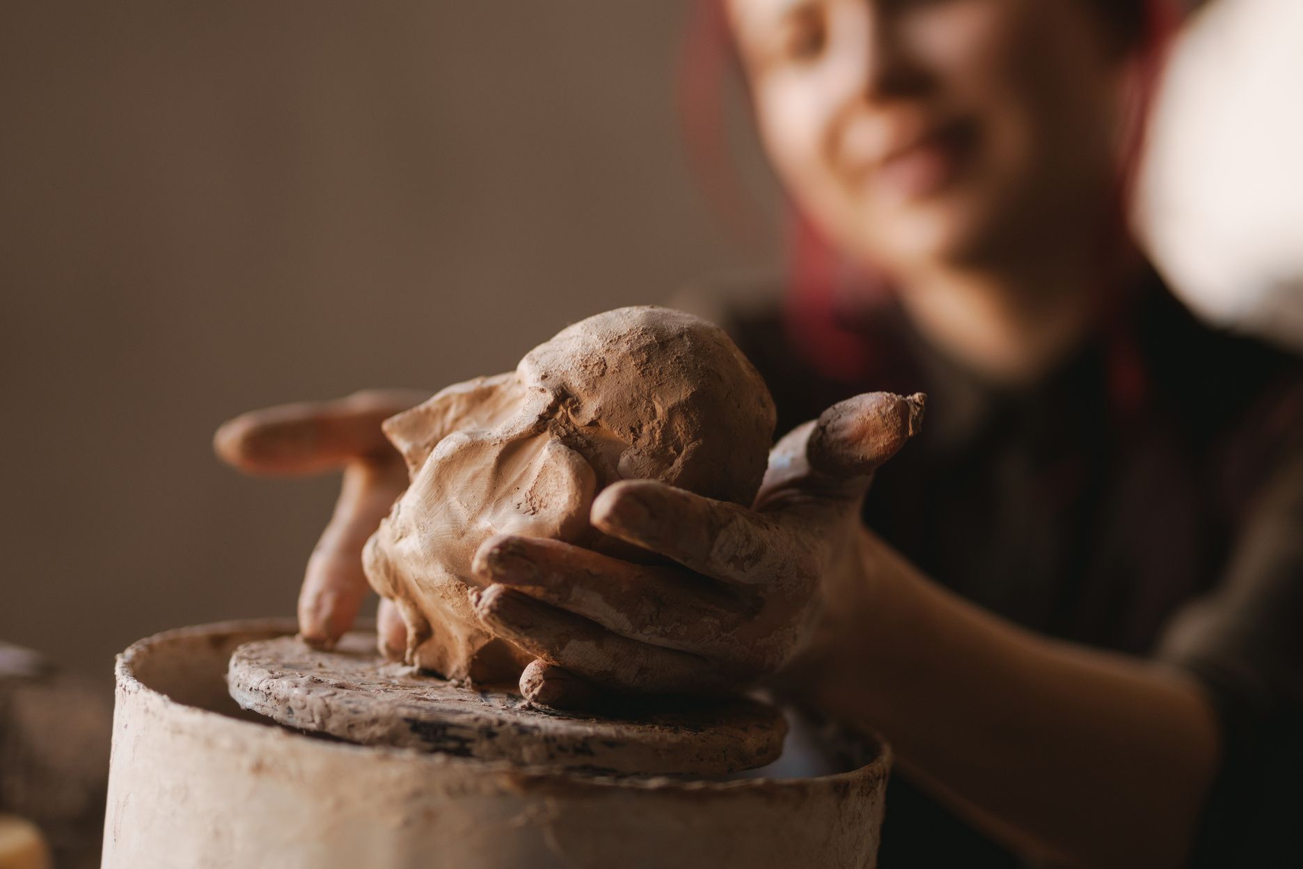 Young Woman Sculptor Artist Creating a Bust Sculpture